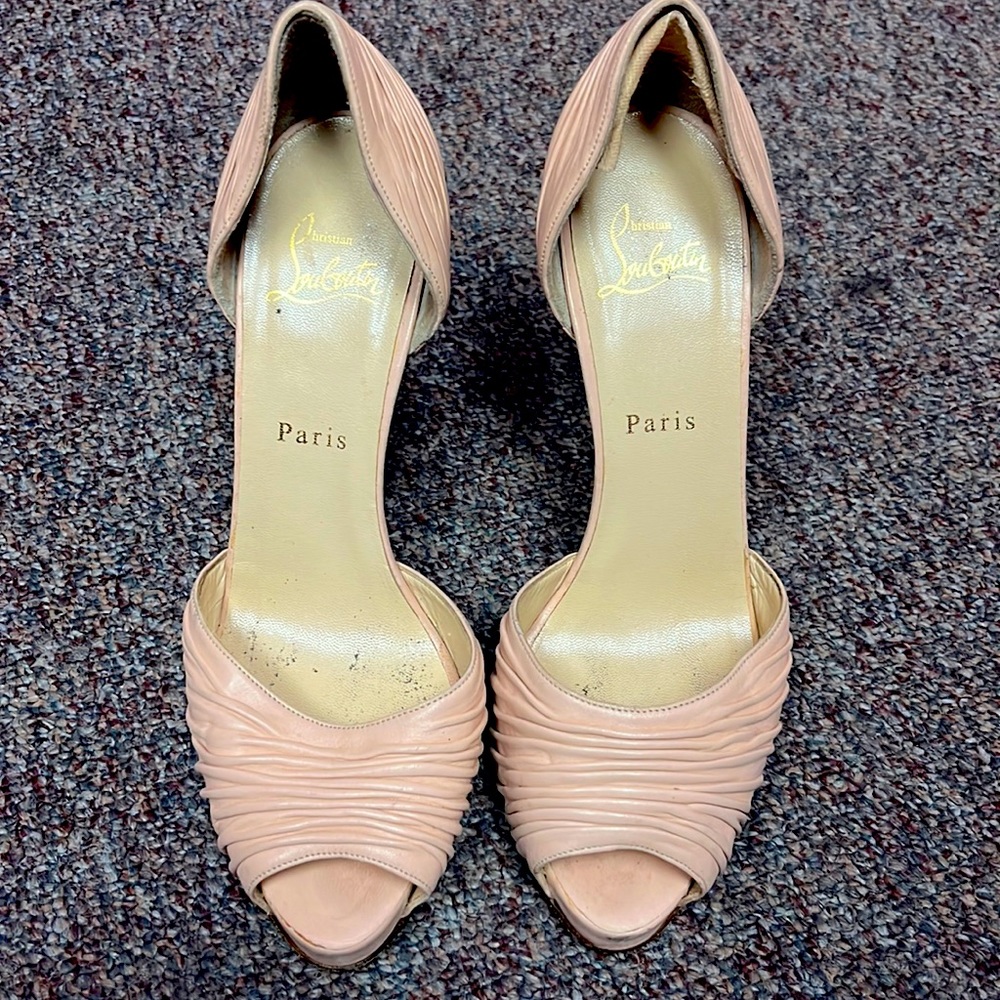 Christian Louboutin Pink nude size 39 peep toe sandal. They are a pinky nude.